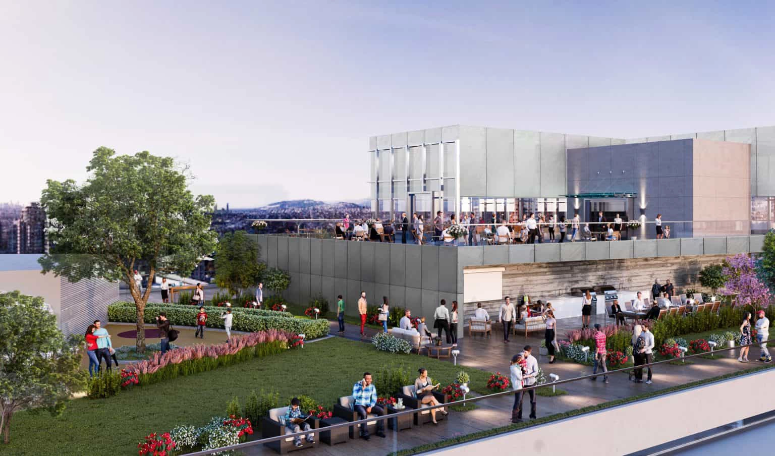 A rooftop space with people enjoying the view and greenery.