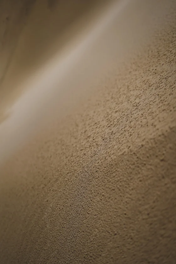 An abstract image of sand coming into focus.