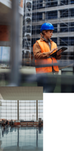 1. A worker with a safety vest scroll through a tablet at a construction site. 
2. A wide view of people walking through a tall glass walled space.