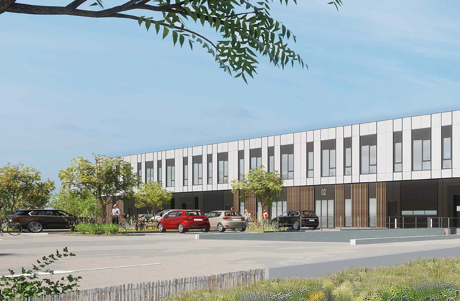 A modern building with a tree in the foreground.