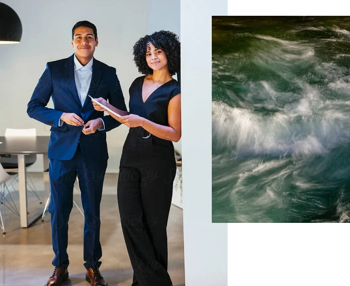 1. A pair of office workers smiling at the camera. 2. Rushing waves in a body of water.